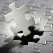Missing plug load control puzzle piece being inserted into the puzzle