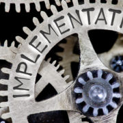 Connected gears with one gear labelled implementation
